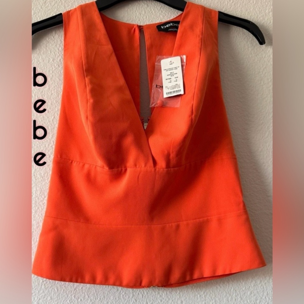 very beautiful bebe satin crepe orange top😍